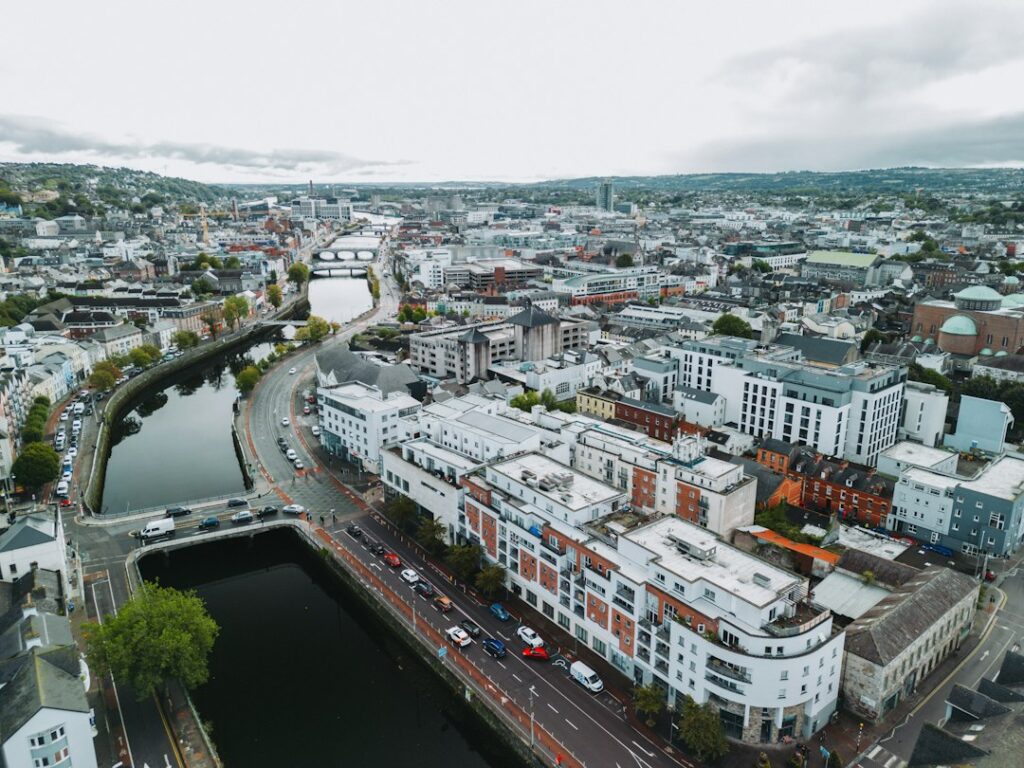 an aerial view of a city with a river running through it